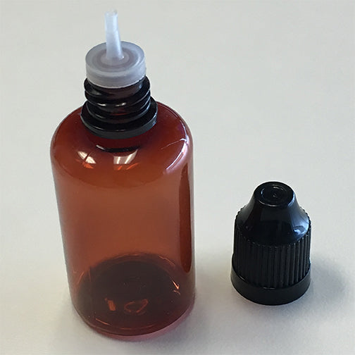 bottle with dropper and cap